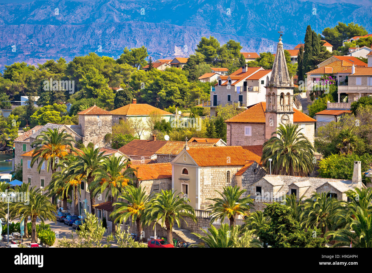Splitska village stone landmarks in palm trees, island of Brac, Croatia Stock Photo Alamy
