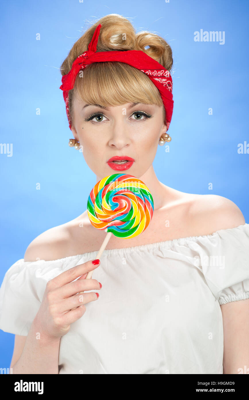 Pin up girl with candy lollipop Stock Photo - Alamy