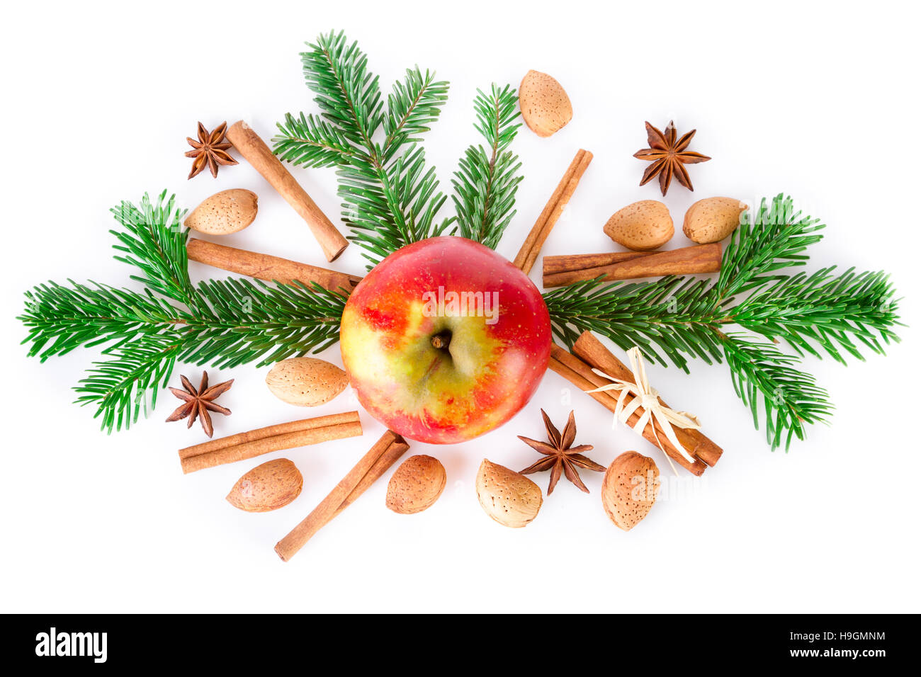 Christmas festive arrangement with apple and christmas spices on white. Top view. Stock Photo