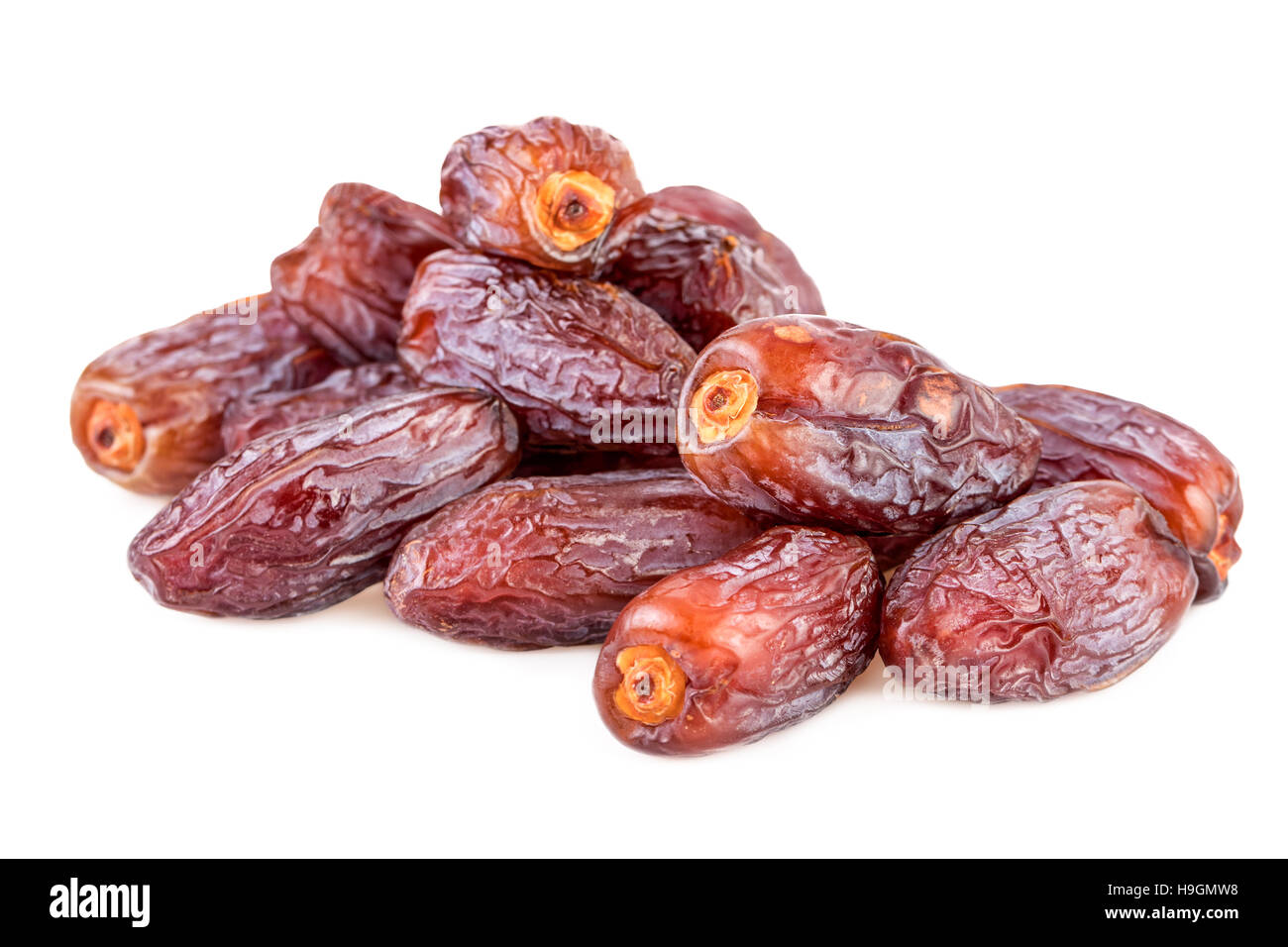 Dry dates handful of dry dates isolated on white Stock Photo Alamy