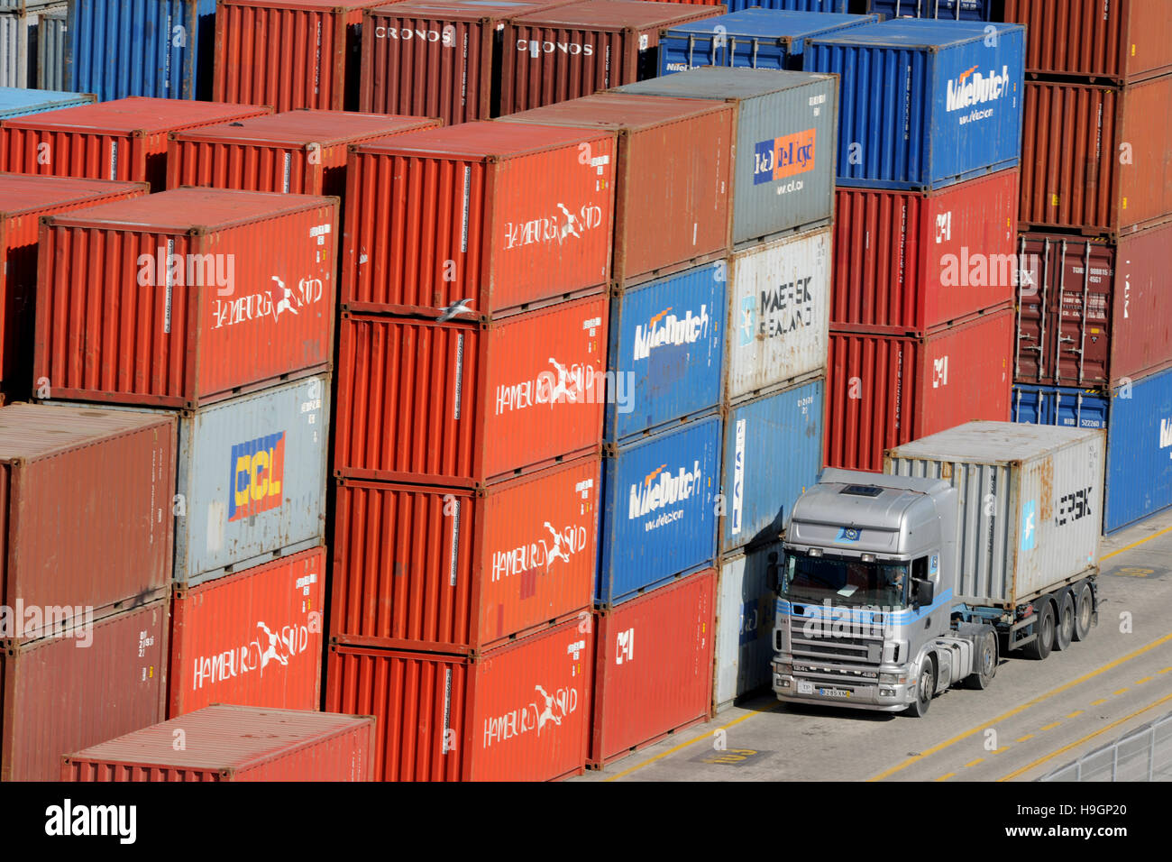 Shipping at the Port of Lisbon Portugal with container ships being