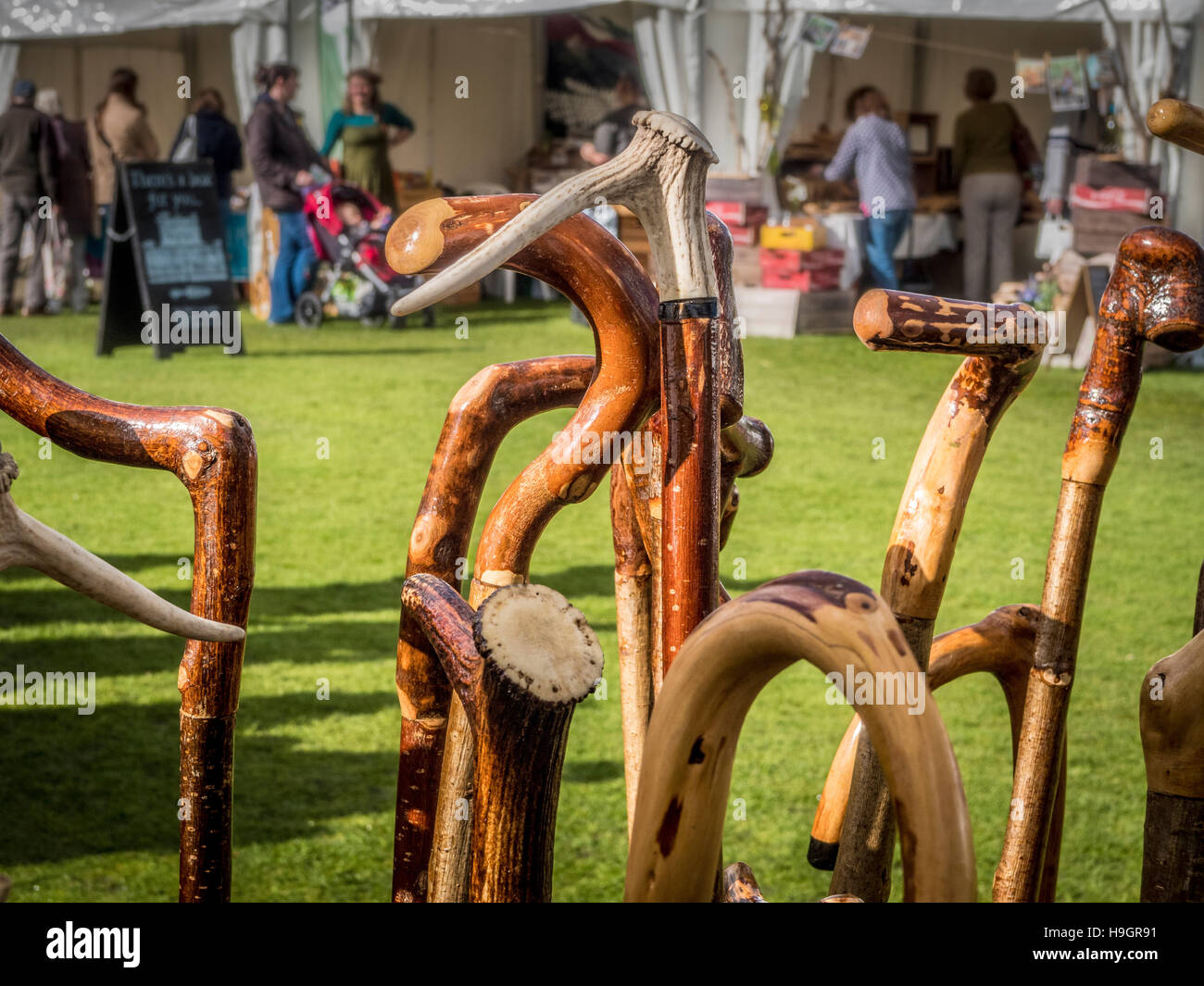 Hand crafted walking sticks for sale at country show Stock Photo