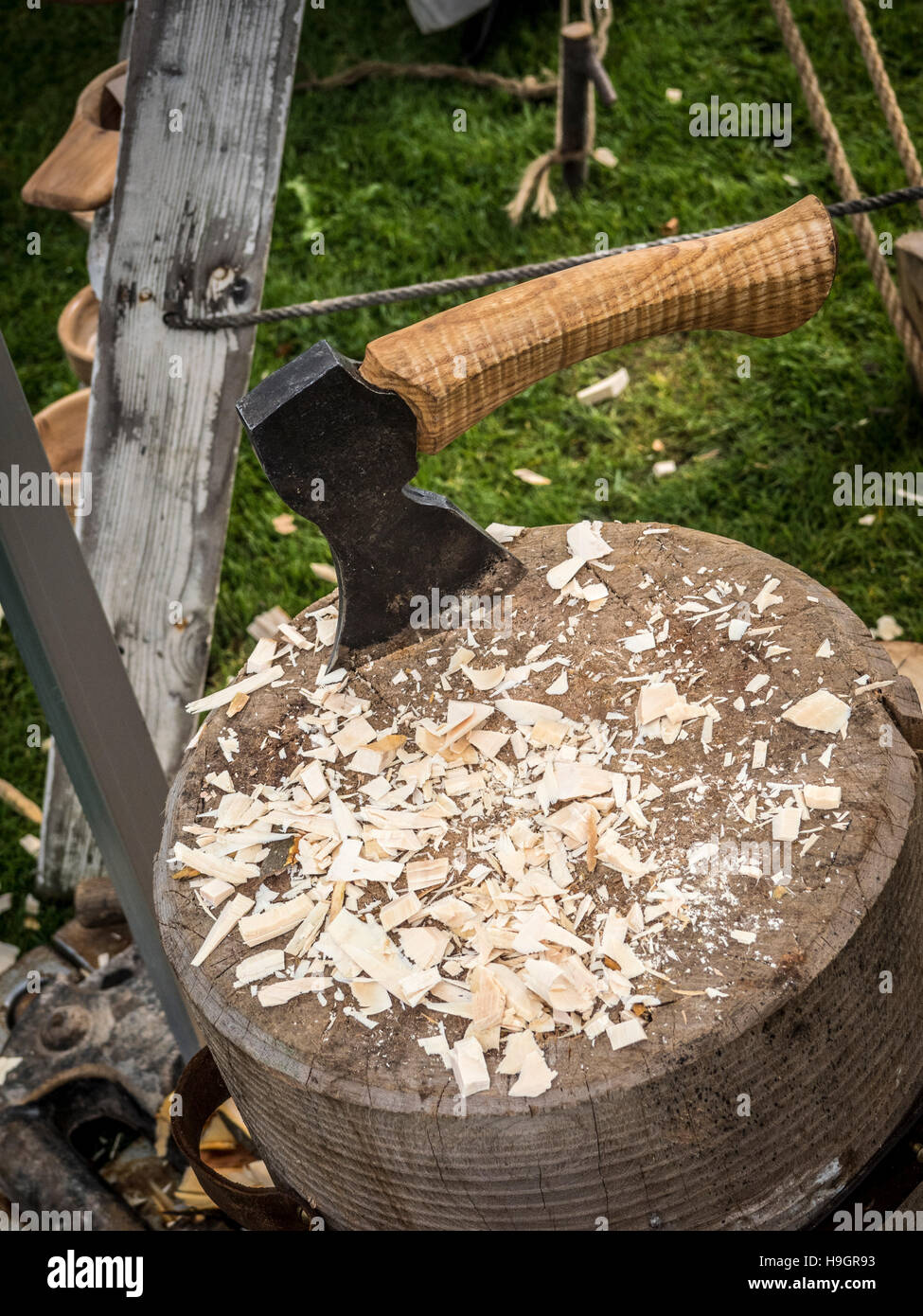 axe on chopping block at country fair Stock Photo