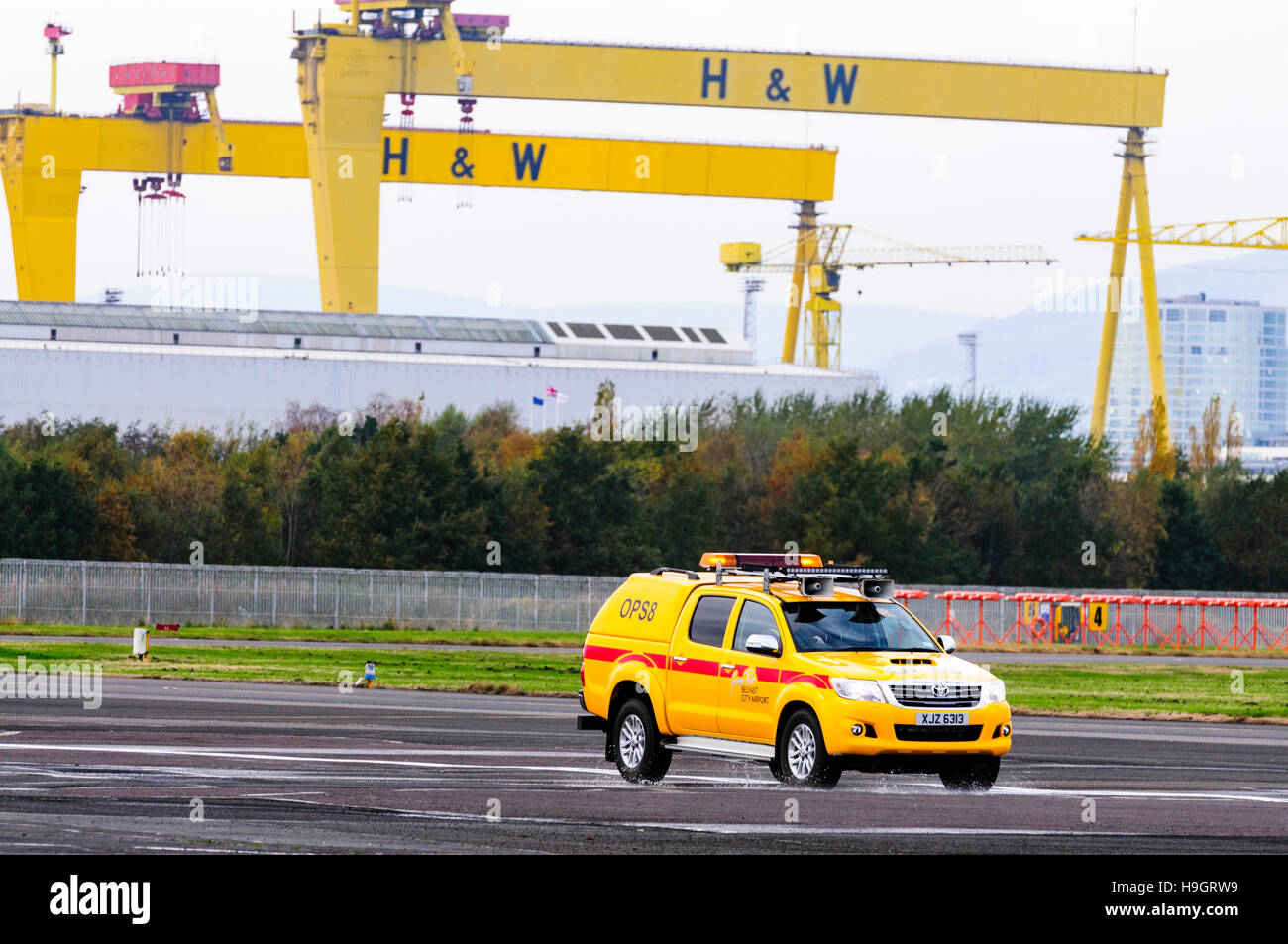 Bird scarer clears the runway at Belfast City Airport Stock Photo