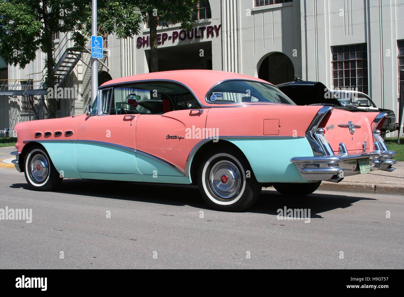 A 1956 coral pink and aqua green Buick Century Hardtop at the 'Back to the 50's Car Show' on the Minnesota State Fairgrounds Stock Photo