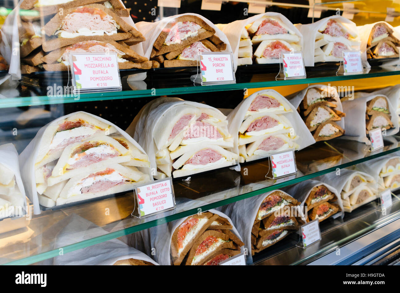 Freshly made sandwiches on sale in a sandwich shop in Milan, Italy. Stock Photo