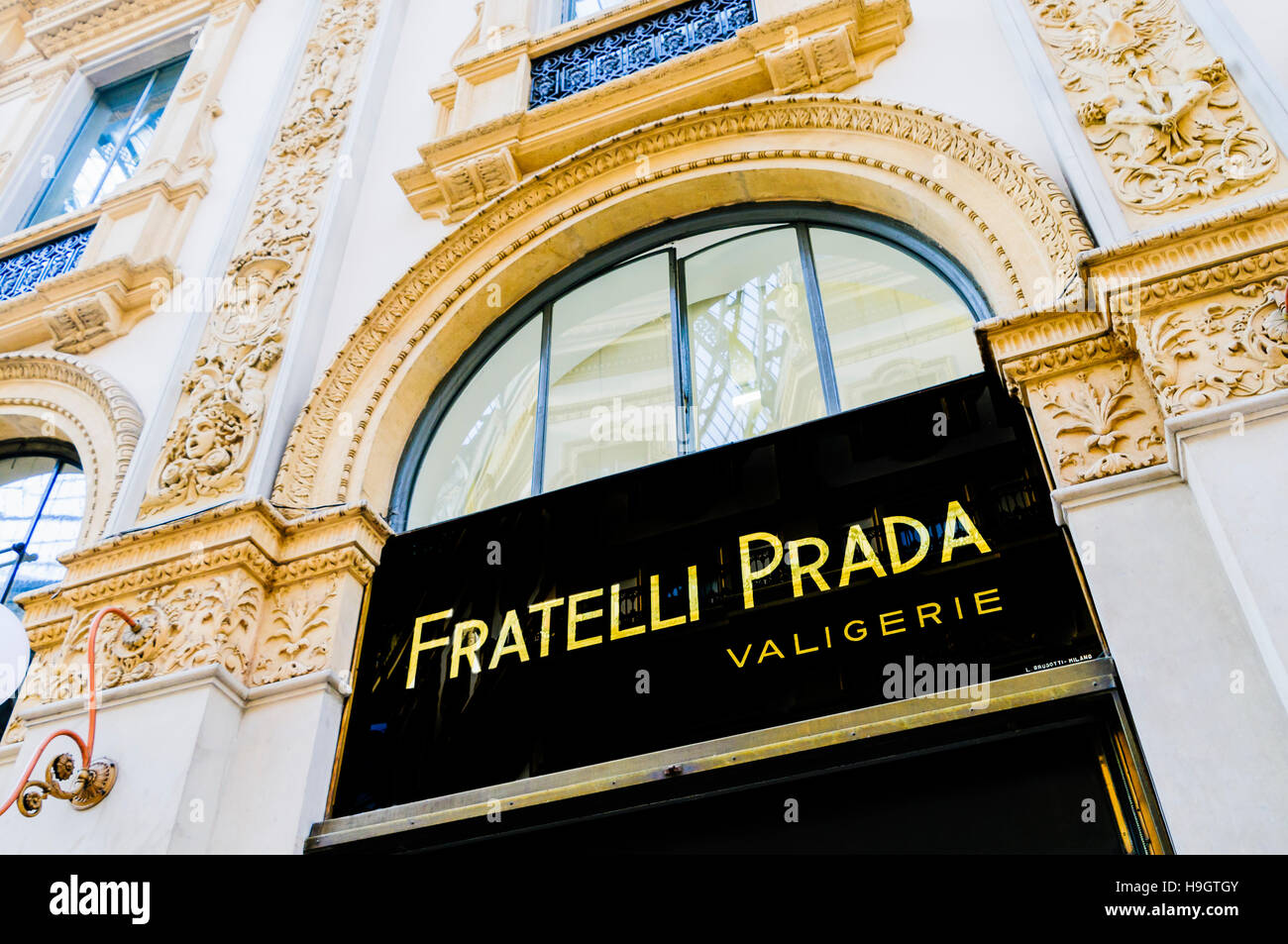 Fratelli Prada shop in Galleria Vittorio Emanuele II, a shopping arcade specialising in designer clothing, Milan, Italy. Stock Photo