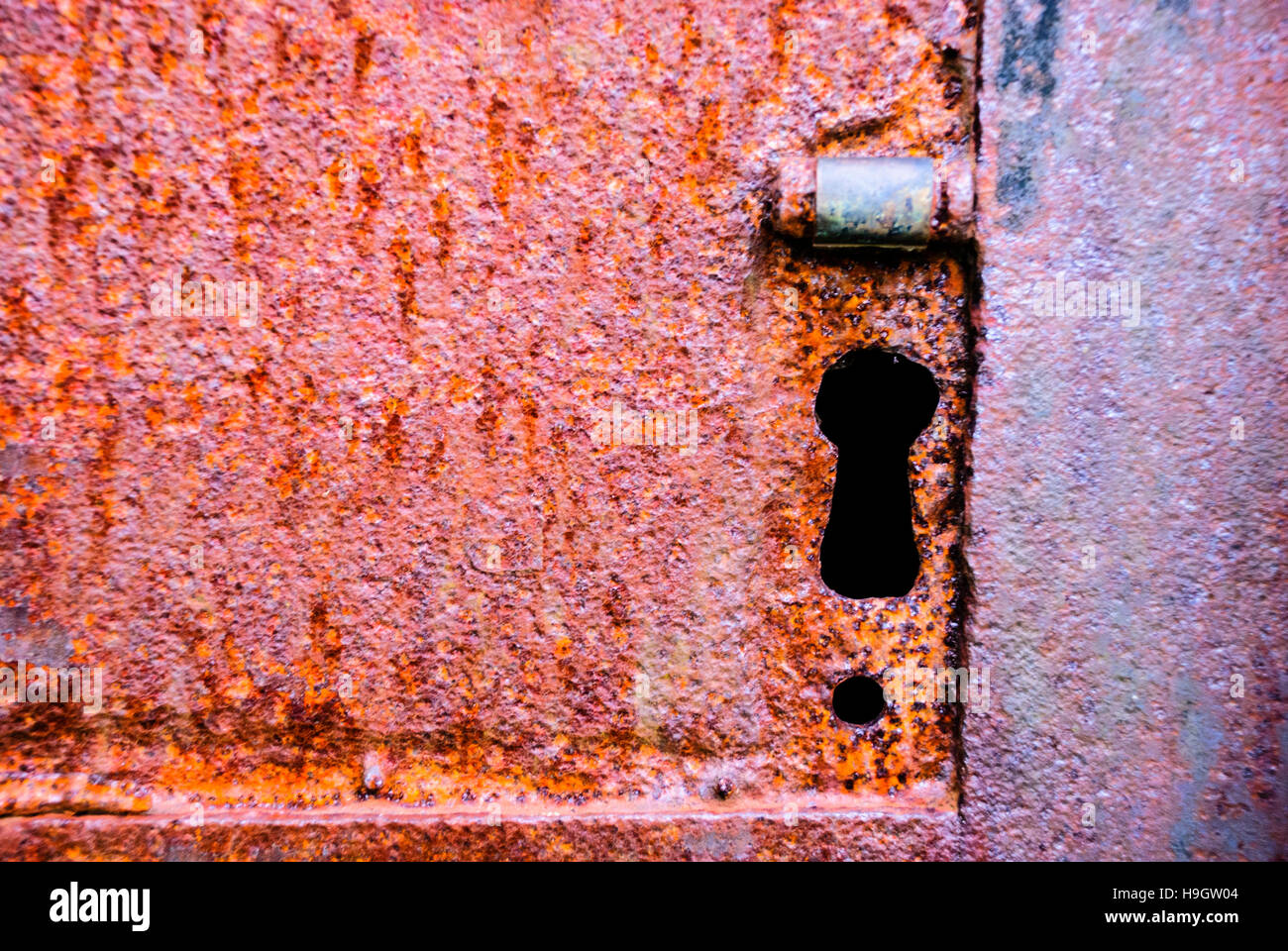 Keyhole on a very old, rusty iron door Stock Photo Alamy