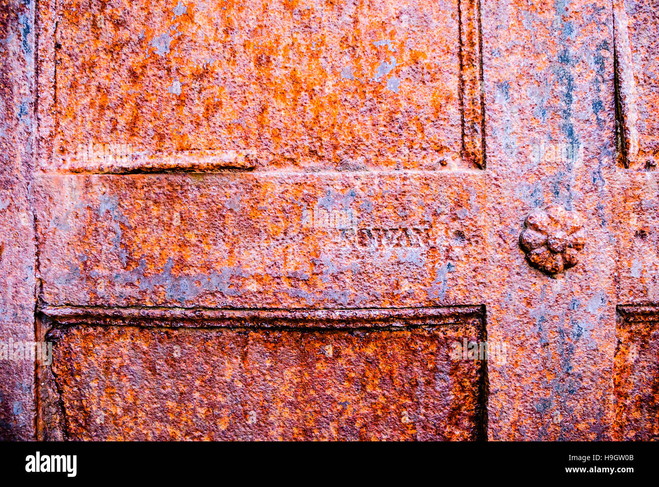 "Rowan" stamped on the rusty iron door of a tomb in a graveyard Stock