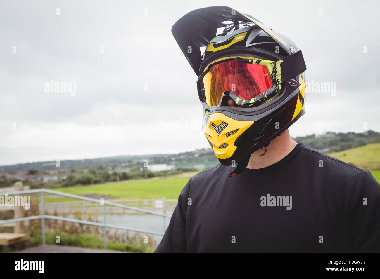 Wearing a helmet hi-res stock photography and images - Alamy