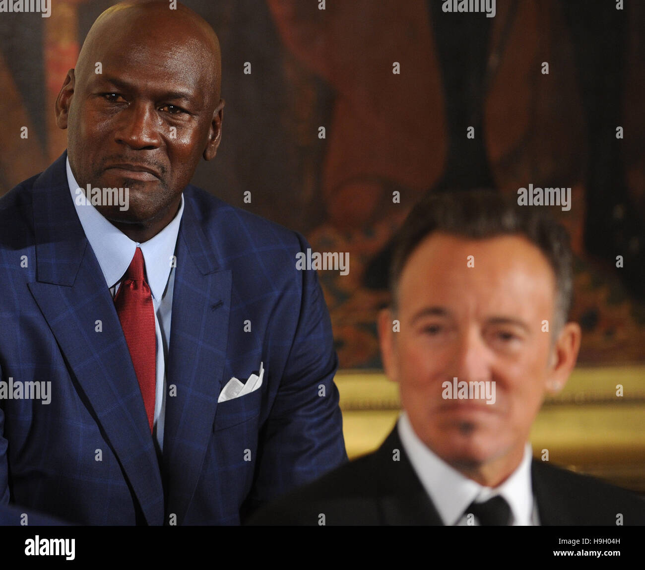 Washington, United States. 22nd Nov, 2016. Michael Jordan (left) and Bruce  Springsteen listen as U.S. President Barack Obama makes remarks before  presenting them with the Presidential Medal of Freedom in a ceremony