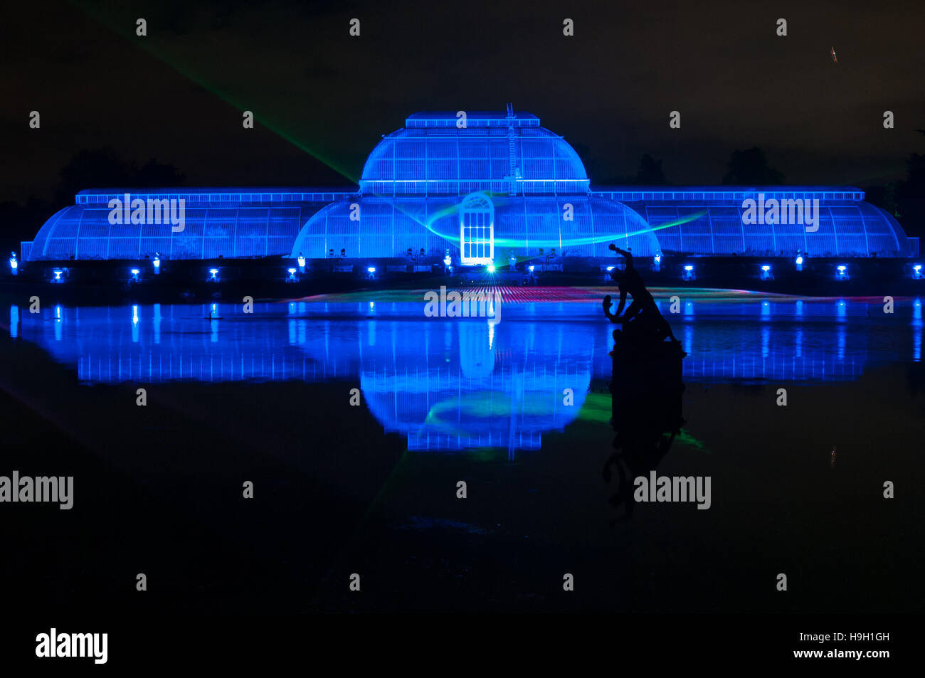 London, UK. 22nd November, 2016. The Palm House illuminated with laser beams for the Christmas at Kew Light Trail 2016. More than 60,000 lights light up the trees, plants and gardens. The trail is more than a mile long and includes artworks from both UK and international artists and designers. The trail opens on 23rd November and lasts till 2nd January 2017. Credit:  Tricia de Courcy Ling/Alamy Live News Stock Photo