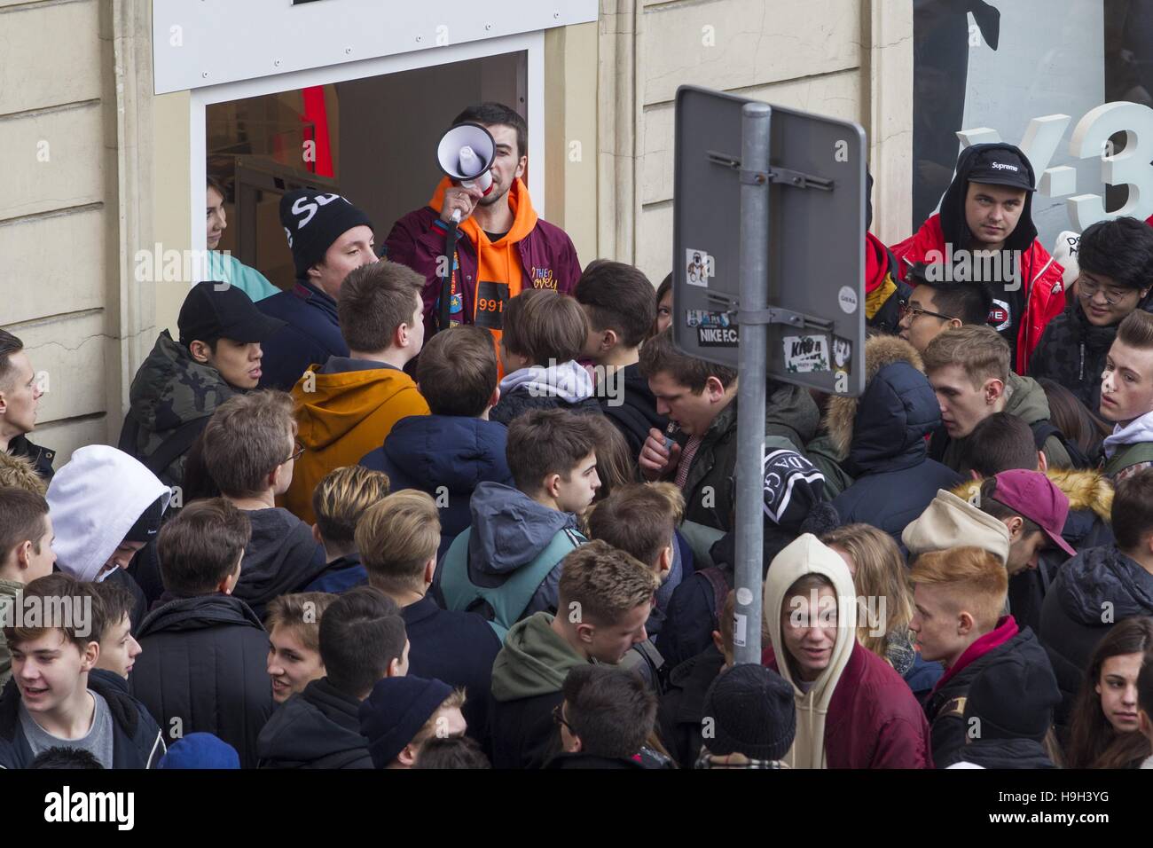 Warsaw, Poland. 23rd Nov, 2016. A huge crowd of people queue in front of  the CL20 foot store to buy new yeezy boost 350 by Kanye West on November  23, 2016 in
