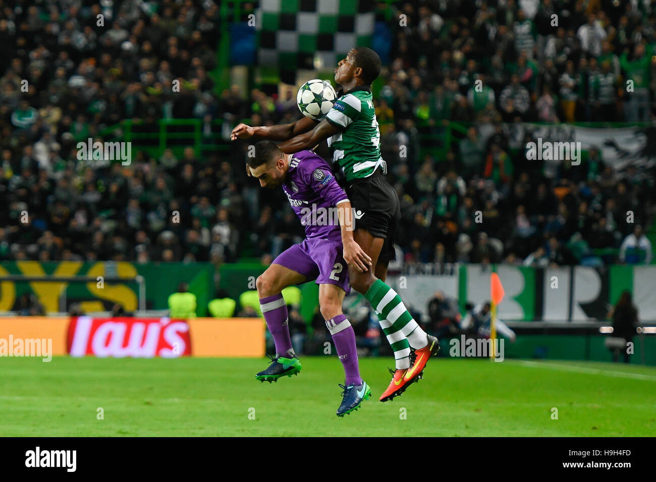 Lisbon, Portugal. 22nd November, 2016. SPORTING-REAL MADRID  - Carvajal (L) and Zeegelaar (R) in action during UEFA Champions League football match between Sporting and Real Madrid, in Lisbon, Portugal. Photo: Bruno de Carvalho/ImagesPic Credit:  imagespic/Alamy Live News Stock Photo