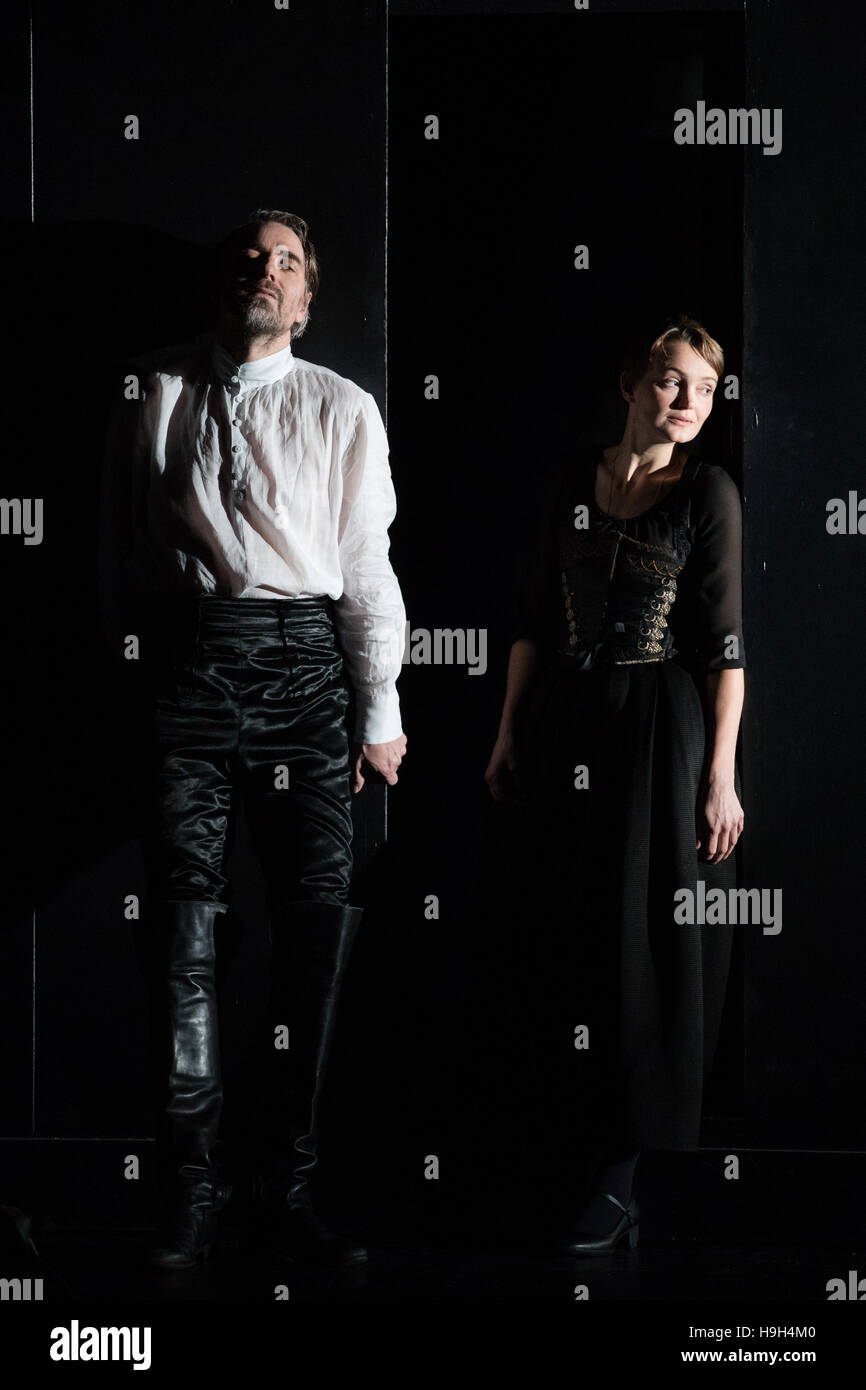 The actor Jens Harzer as Hauke Haien and Birte Schnoeink as Elke stand on stage of the Thalia Theatre for the photo rehearsal of the play 'Der Schimmelreiter' (lit. 'The rider of the white horse') in Hamburg, Germany, 23 November 2016. The play by  Th. Storm and J. Simons will have its premiere on the 25 November 2016. Photo: Christian Charisius/dpa Stock Photo