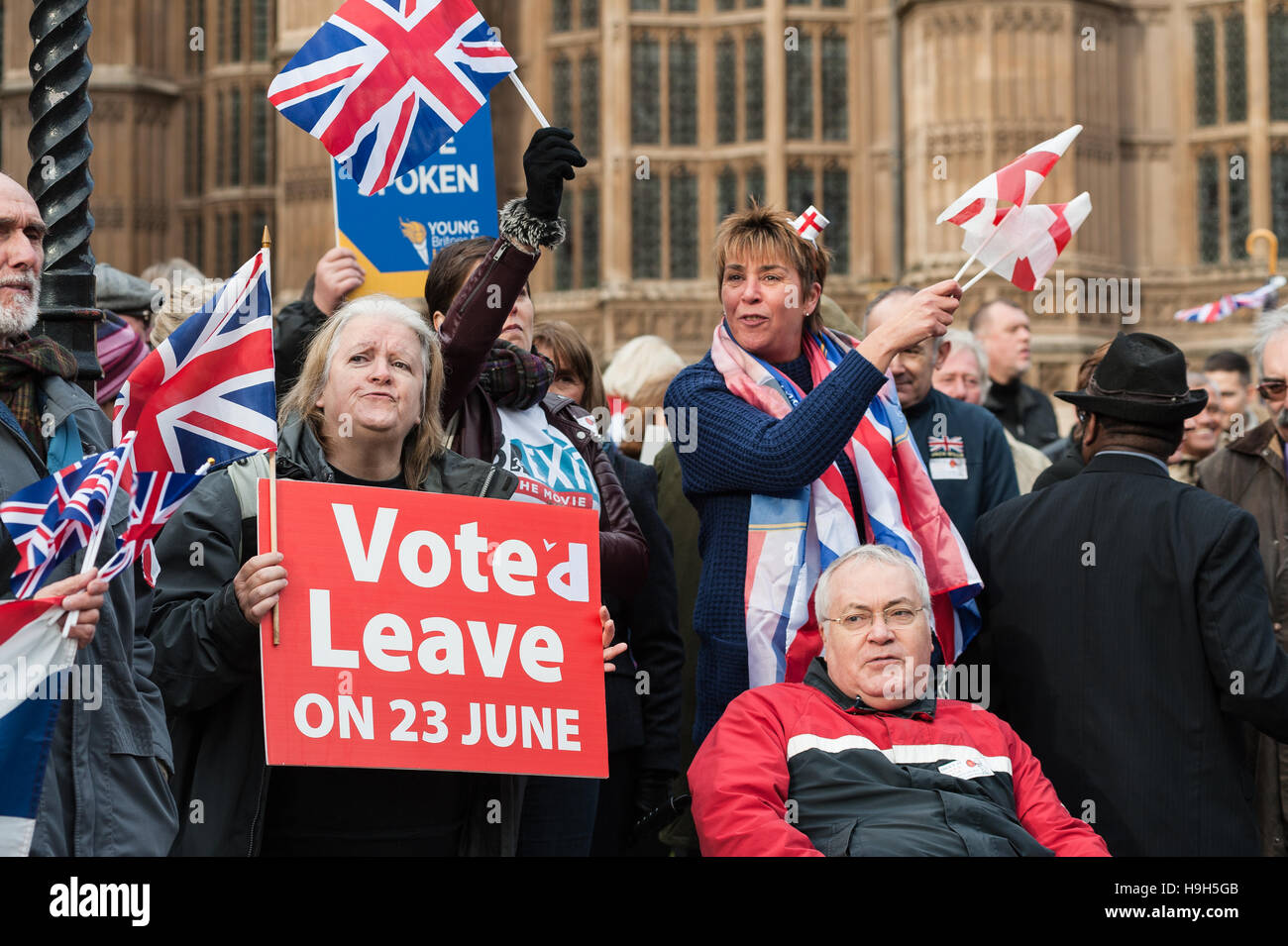 London, UK. 23rd November 2016. Hundreds of pro-Brexit supporters gather to demonstrate outside Houses of Parliament on the day of the Autumn Statement. The main focus of the protest was to demand immediate triggering of Article 50 by the Prime Minister Theresa May and to oppose the recent High Court ruling to give MPs the final decision on the matter. The protesters call on the judges, government and MPs to respect and act on the result of the EU referendum where 52% voted to leave the European Union. Wiktor Szymanowicz/Alamy Live News Stock Photo