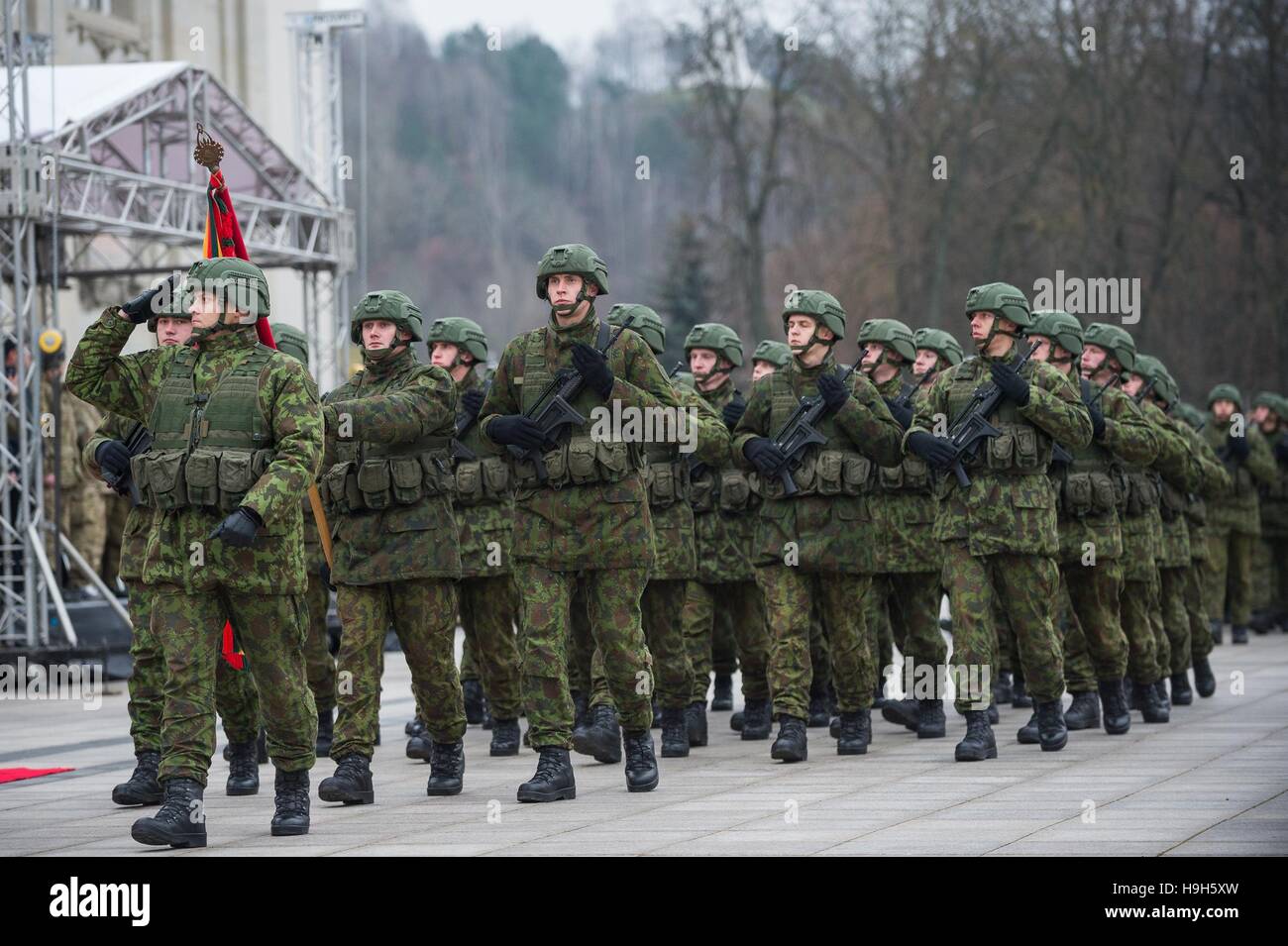 Vilnius, Lithuania. 23rd Nov, 2016. Members of Lithuanian armed forces attend the Lithuania's Armed Forces Day celebration in Vilnius, capital of Lithuania, on Nov. 23, 2016. Lithuanian armed forces and troops of some NATO member countries held a gala with formation on Wednesday to celebrate Lithuania's Armed Forces Day. The first decree on establishing armed forces was appoved on Nov. 23, 1918, which became the Armed Forces Day of the Baltic country. © Alfredas Pliadis/Xinhua/Alamy Live News Stock Photo