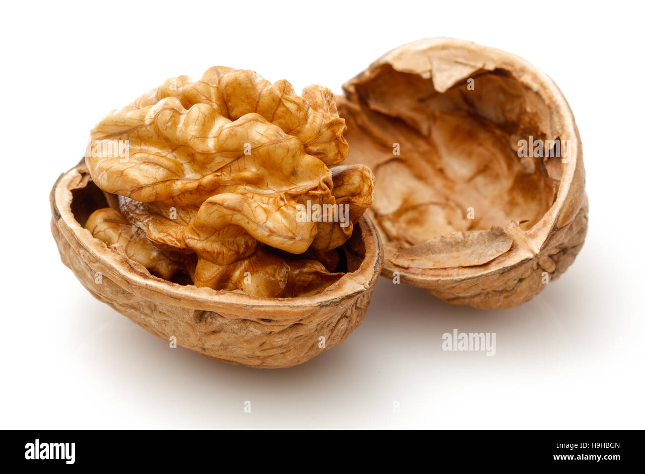 Half walnut kernel. Isolated on a white background Stock Photo Alamy