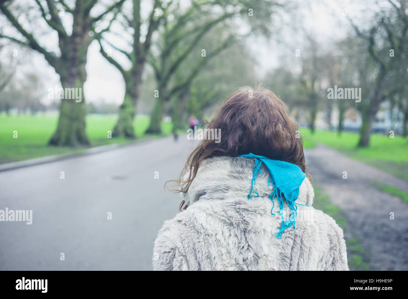 Woman walking coat scarf rear view hi-res stock photography and images ...