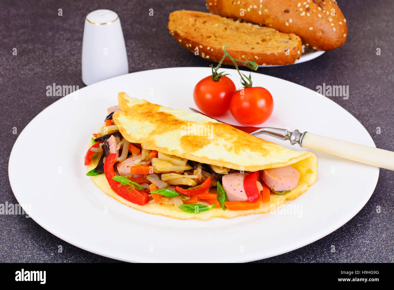 Healthy and Diet Food Scrambled Eggs with Sausage and Vegetables