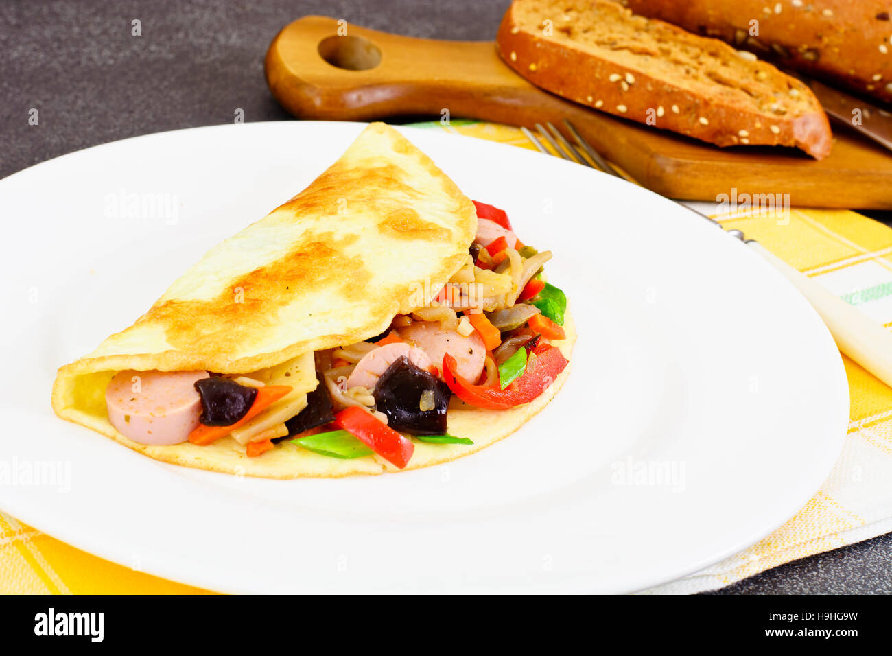 Healthy and Diet Food Scrambled Eggs with Sausage and Vegetables