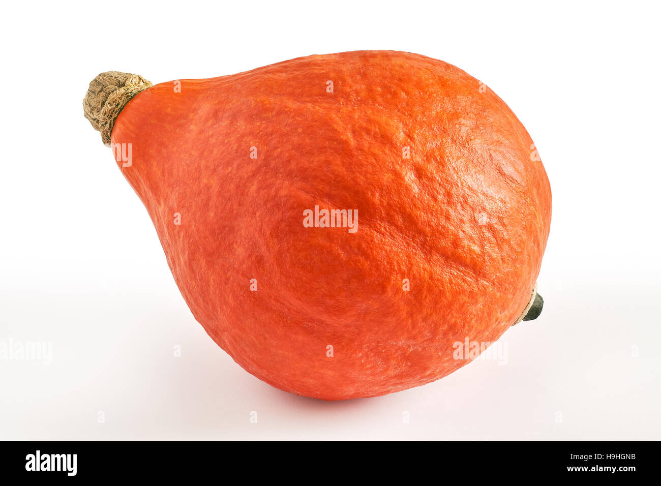 Red kuri squash (Hokkaido pumpkin) isolated on white background Stock ...