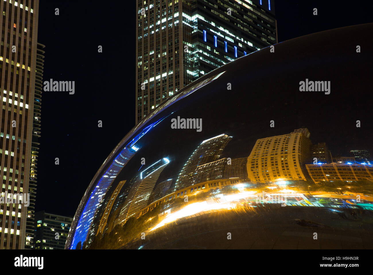 Cloud Gate aka The Bean reflecting the Chicago skyline at night
