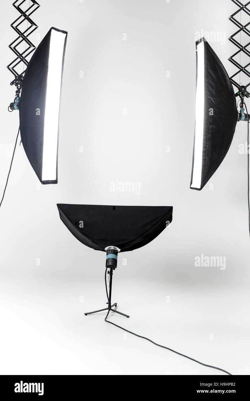 Empty photo studio with lighting equipment Stock Photo - Alamy