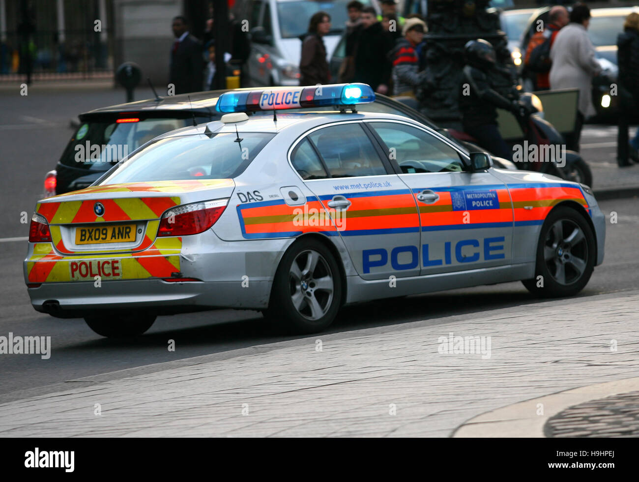 A Metropolitan Police response car responds on blue lights around Trafalgar Square in Central London Stock Photo
