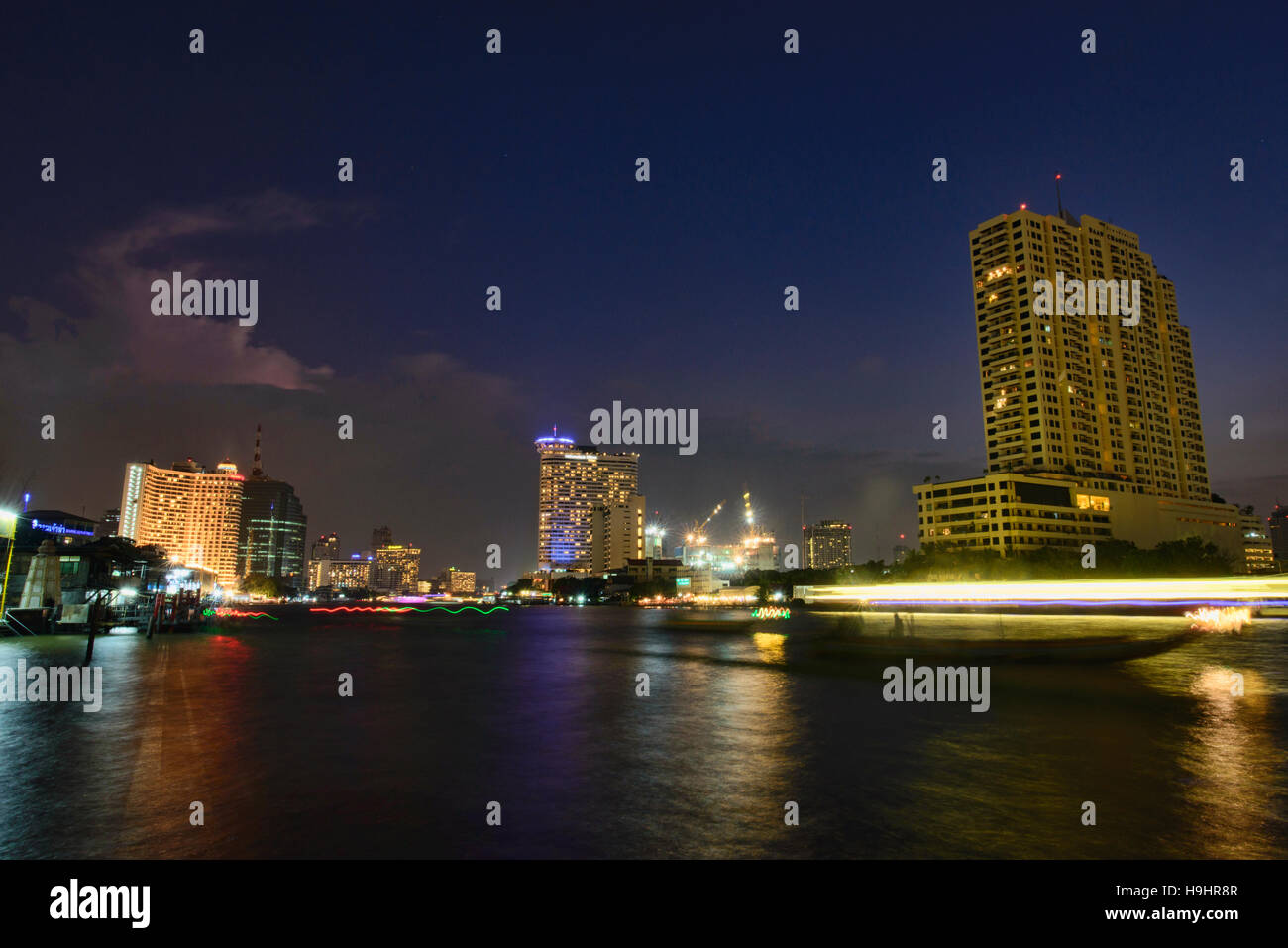 Blue hour on the Chao Phraya River, Bangkok, Thailand Stock Photo