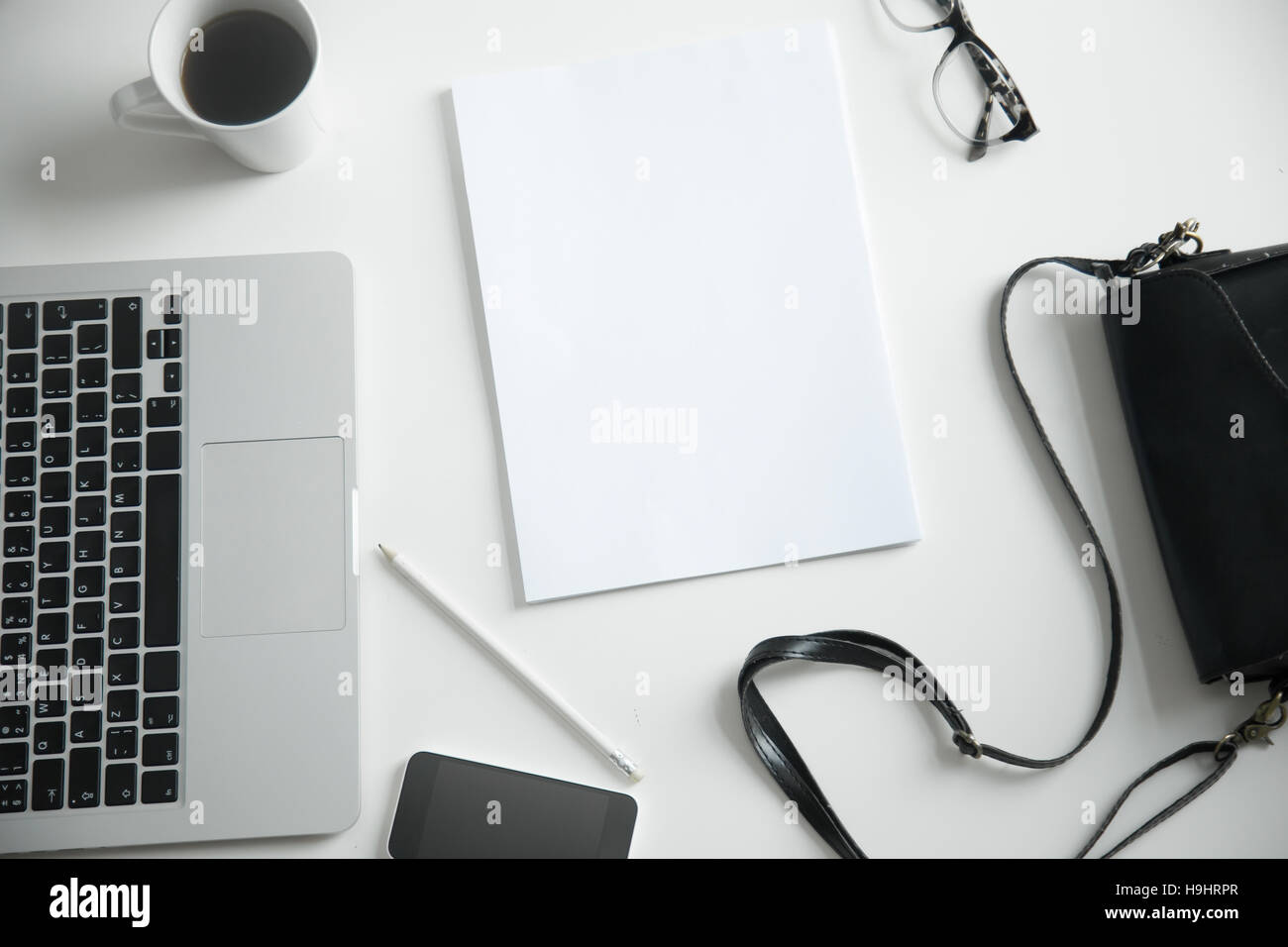 Closeup of office desk with laptop and female office supplies Stock Photo Alamy