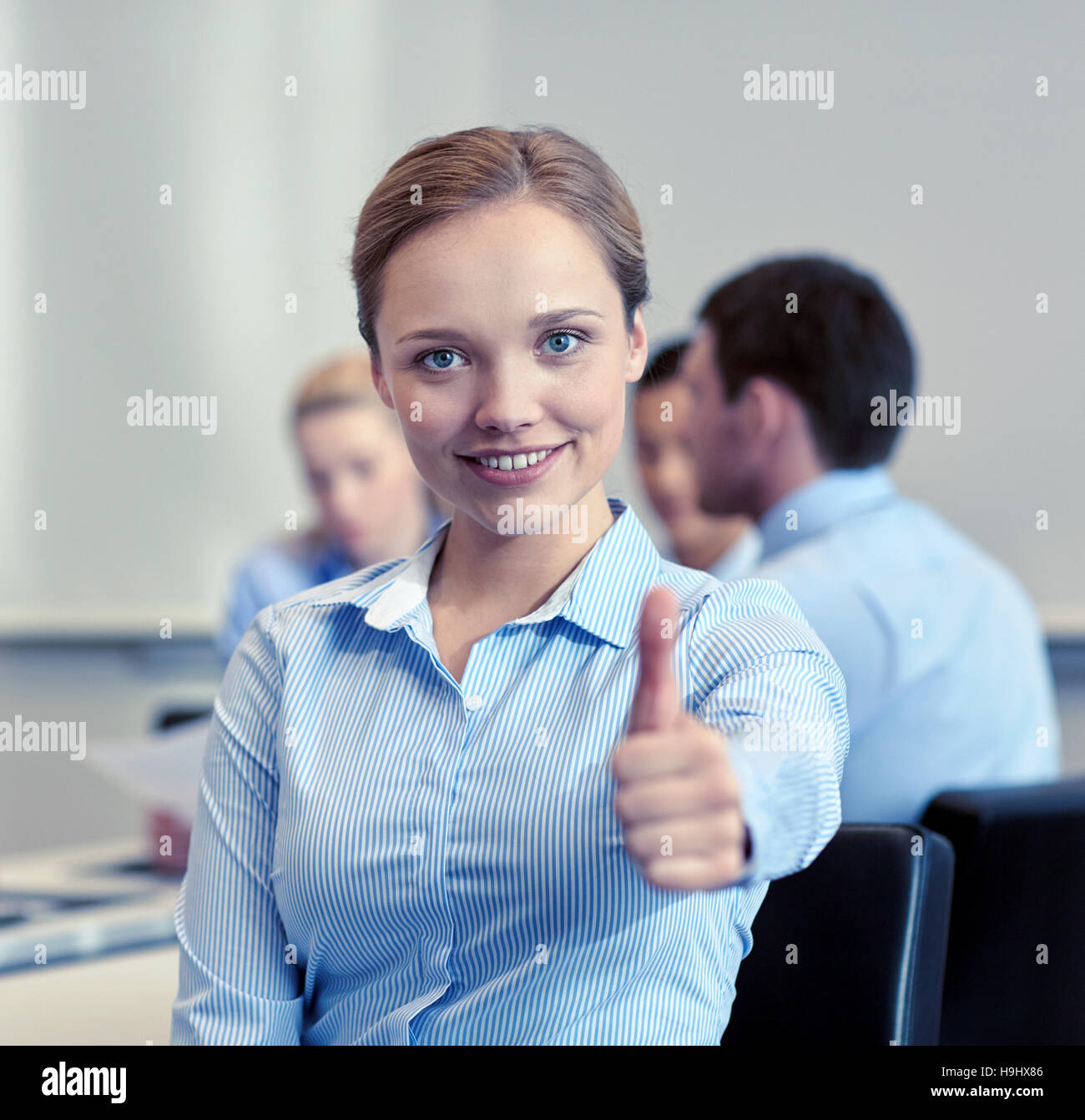 group of smiling businesspeople meeting in office Stock Photo - Alamy