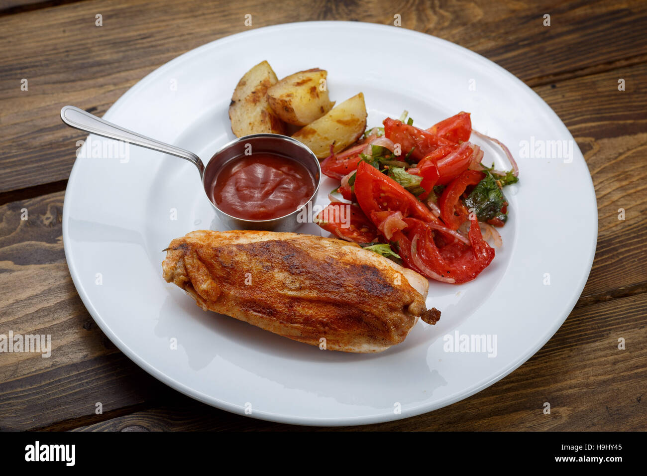 Meat on the bone with sauce Stock Photo Alamy