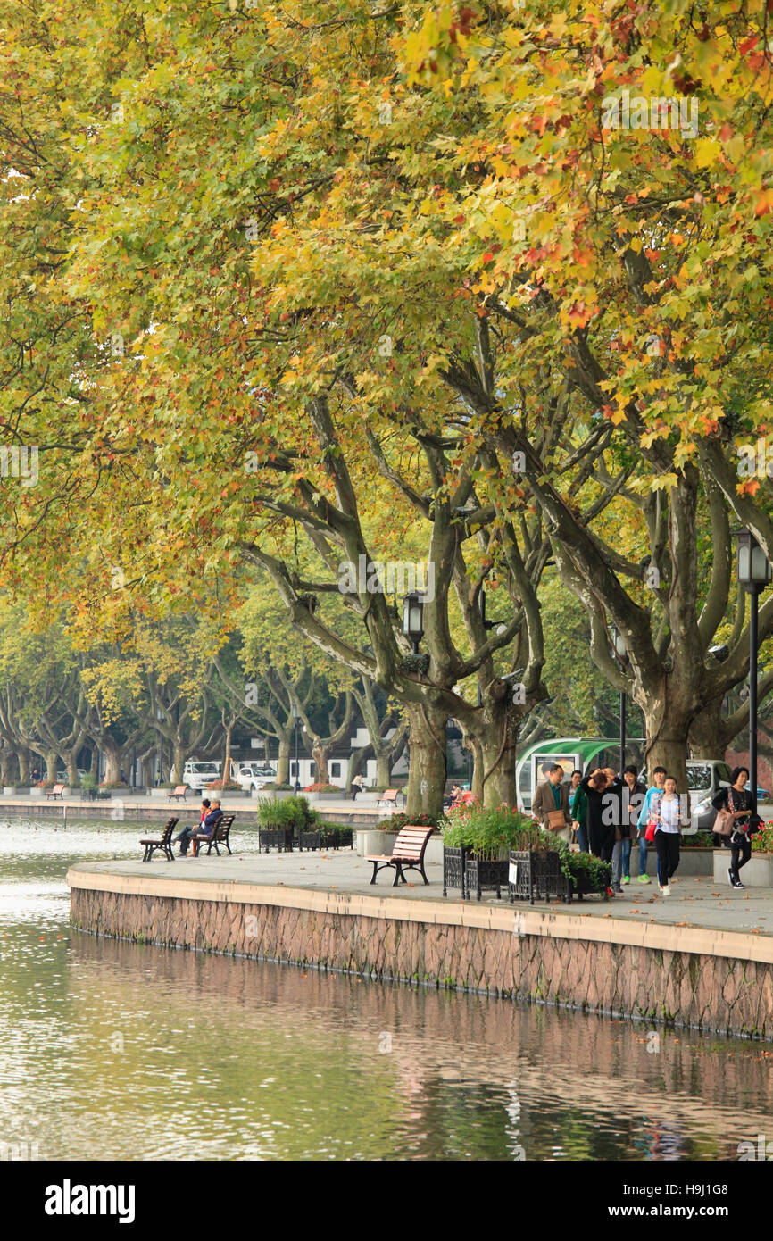 China, Zhejiang, Hangzhou, West Lake, lakeside promenade, people, Stock Photo