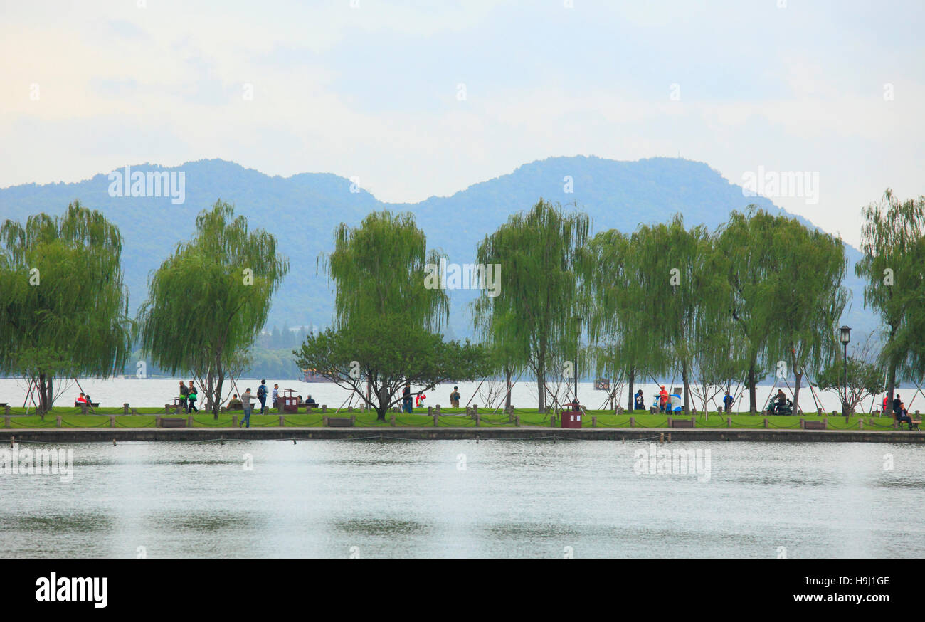 China, Zhejiang, Hangzhou, West Lake, Bai Causeway, people, Stock Photo