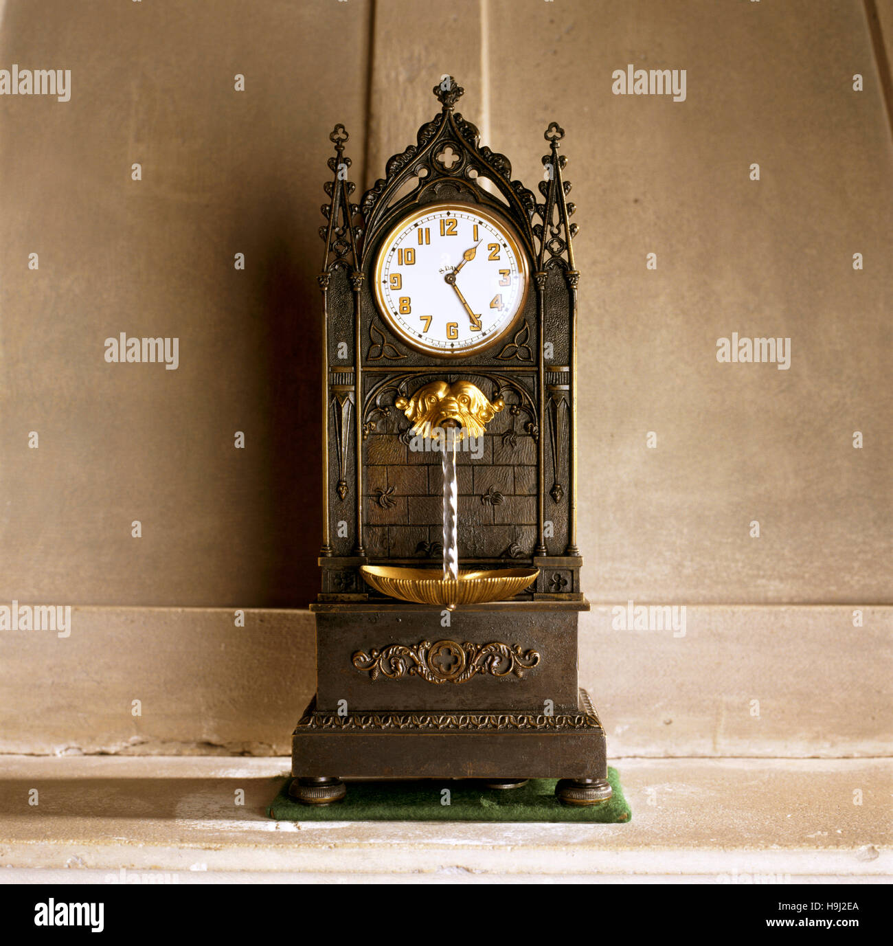Close up of the Swiss Gothic 'fountain' clock in the Prior's room at Anglesey Abbey. Stock Photo