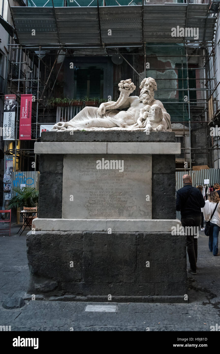 Medieval sculpture on the old streets of Naples, southern Italy, Europe