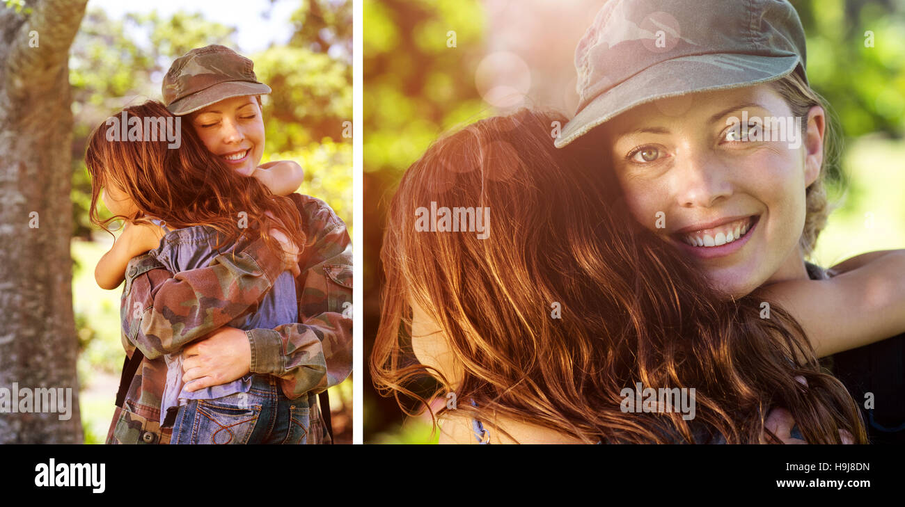Composite image of a soldier mother hugging her daughter Stock Photo
