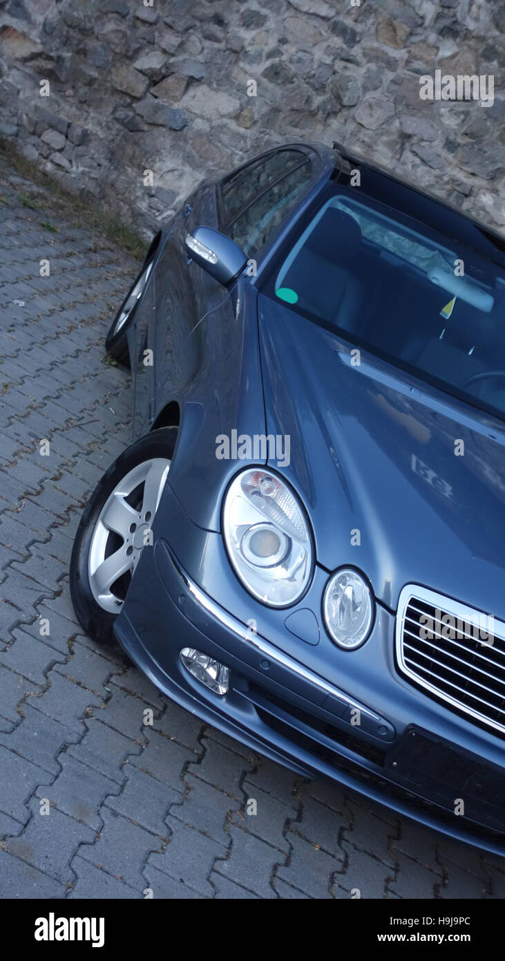 Luxury car design - avant-garde, sunroof, leather, xenon, gear, cluster, rain sensors, light sensors, parktronic, alloy wheels, chrome ornaments Stock Photo