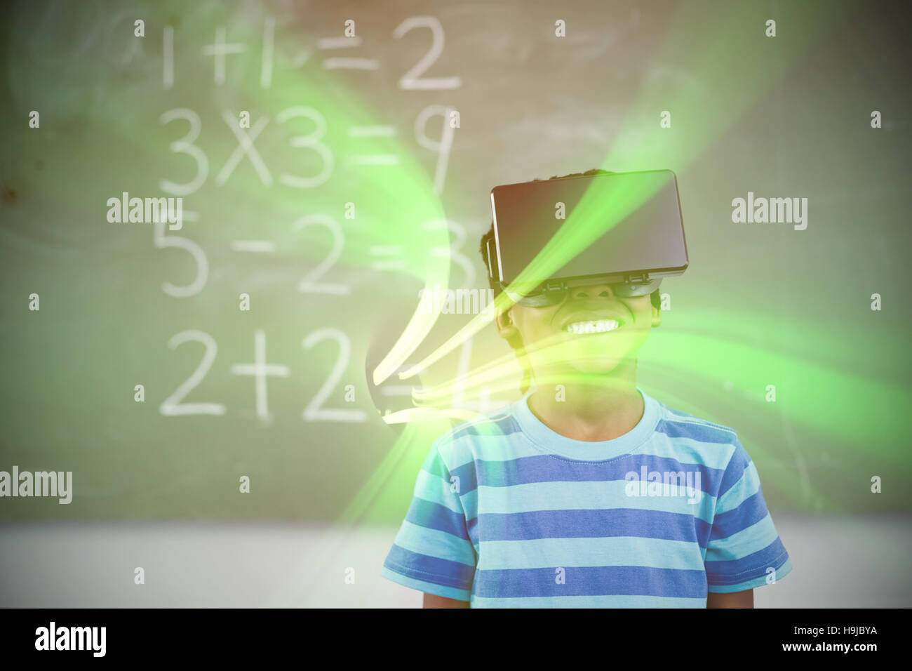 School boy in virtual reality glasses in classroom Stock Photo Alamy