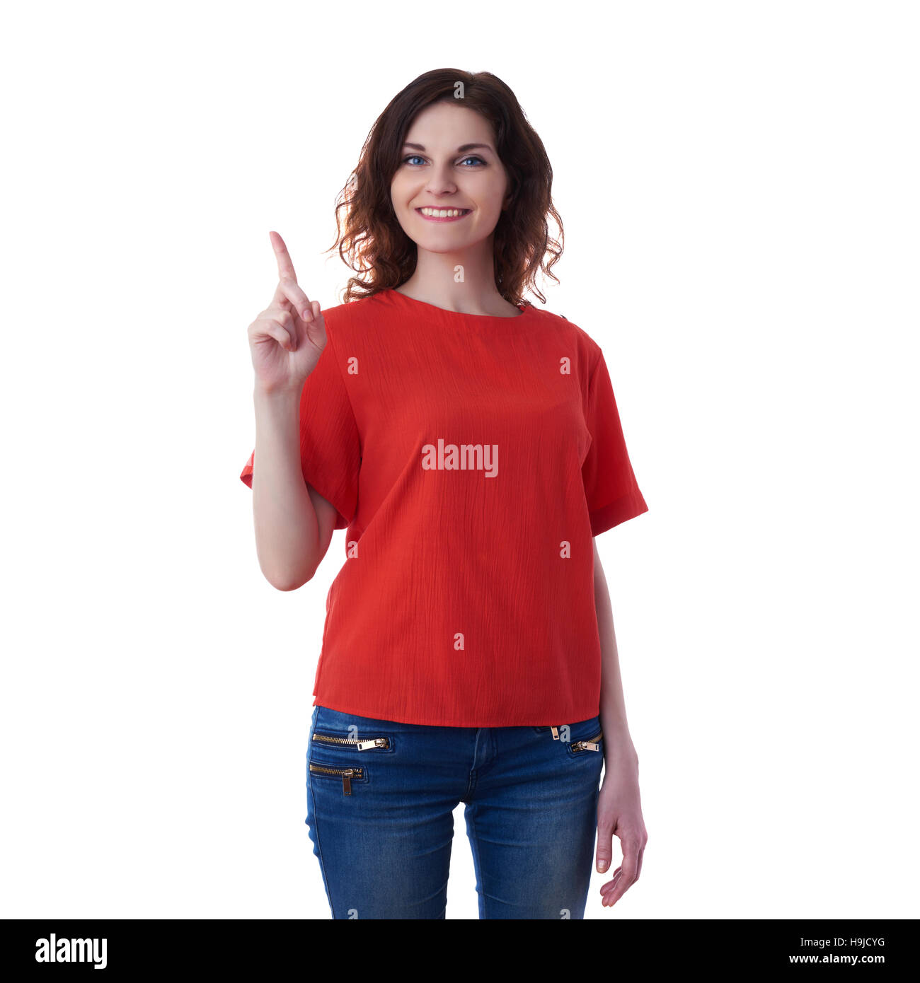 Smiling young woman in casual clothes over white isolated background pointing,showing direction or pushing button, happy people concept Stock Photo