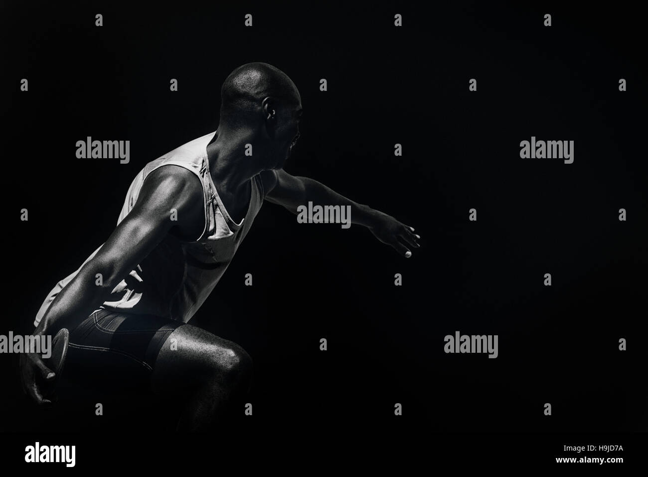 Composite image of rear view of sportsman throwing a discus Stock Photo ...