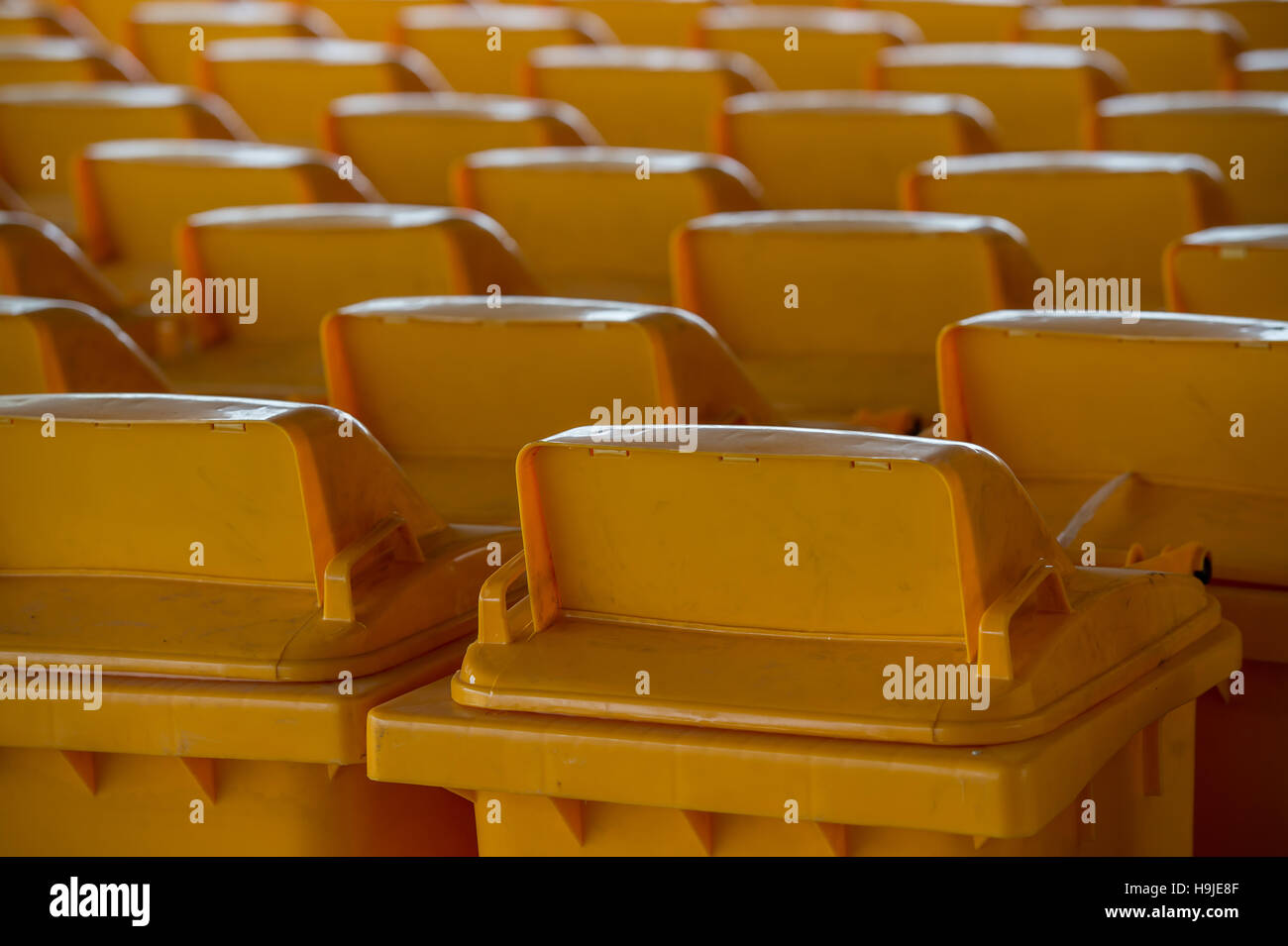 yellow recycling bin Stock Photo Alamy