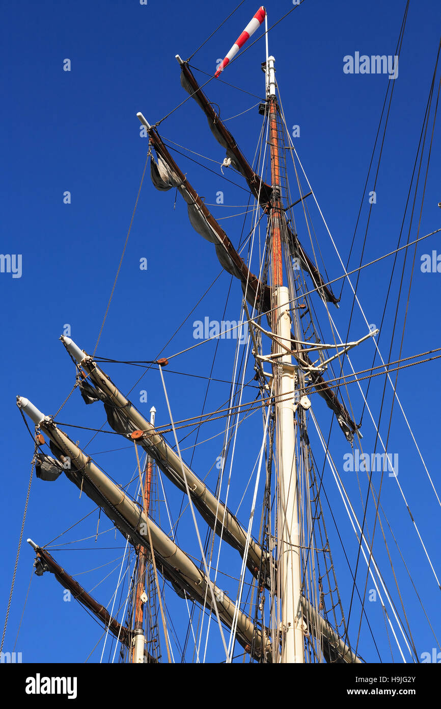 Sailing ship mast and rigging against blue sky Stock Photo Alamy