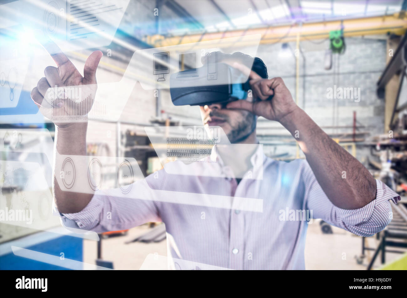 Man Using The Virtual Reality Composite image of man using a virtual reality device Stock Photo - Alamy