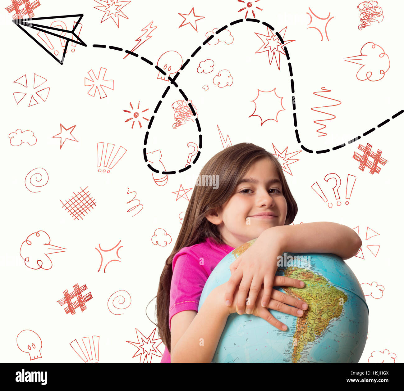 Composite image of cute pupil smiling holding globe Stock Photo - Alamy