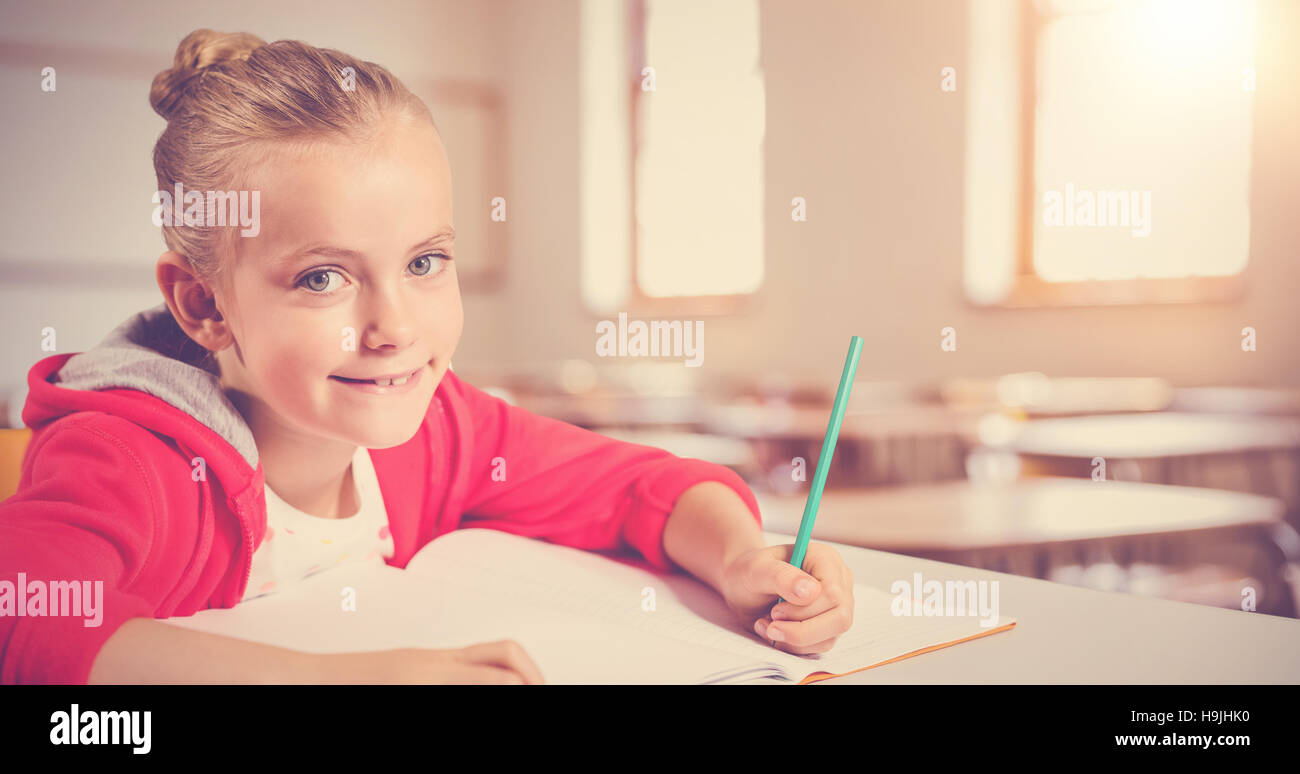 Girl writing book hi-res stock photography and images - Alamy