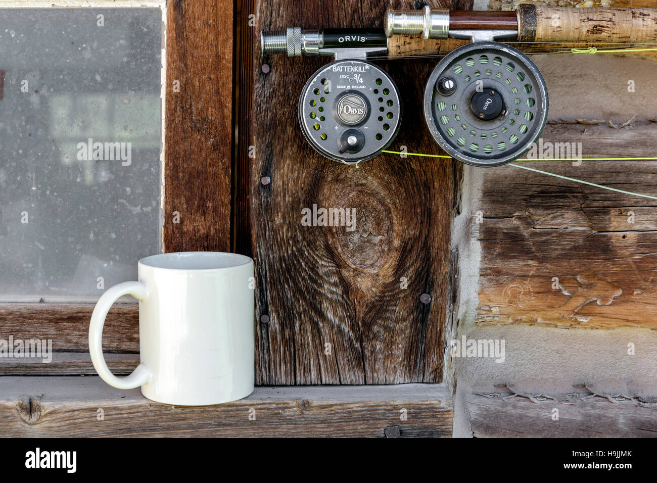 WY01190-00...WYOMING - Fishing rods hung on the wall of the fishing shed at the CM RAnch near Dubois. Stock Photo