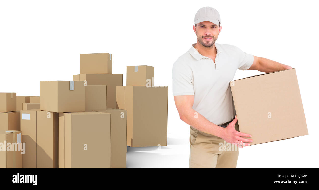Composite image of delivery man with cardboard box Stock Photo