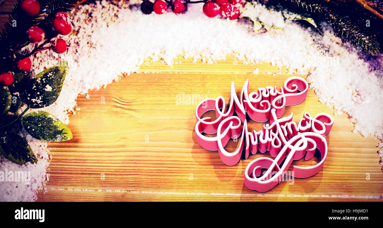 Composite image of high angle view of three dimensional of merry christmas text Stock Photo